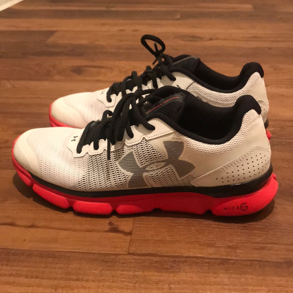 Red, white, black Under Armour running shoes